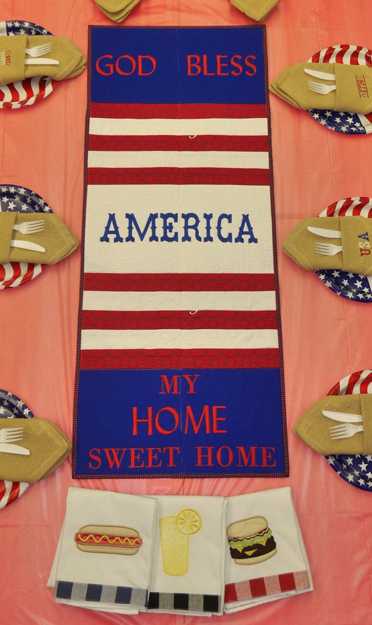 Land of the Free & Home of the Brave stitched on white stripes.